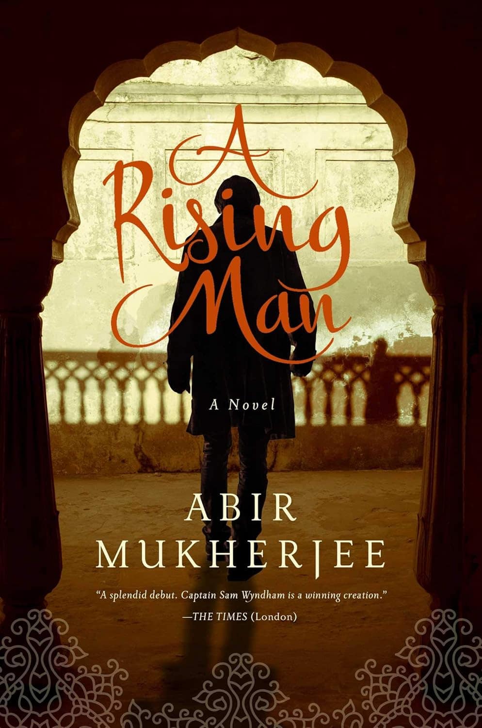 Book cover showing a man walking away from the viewer, framed in an Indian-style arch