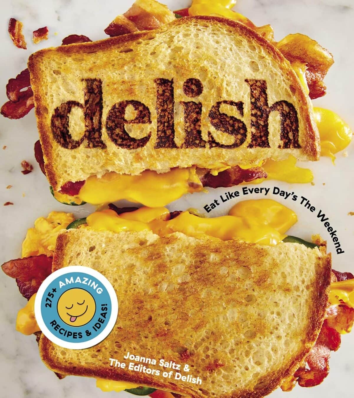 Book cover showing a gooey grilled cheese and bacon sandwich with "delish" burned on to the bread