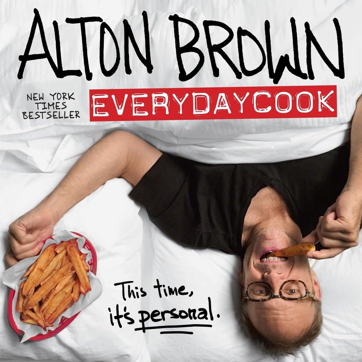 Book cover showing Alton Brown lying in bed eating French fries