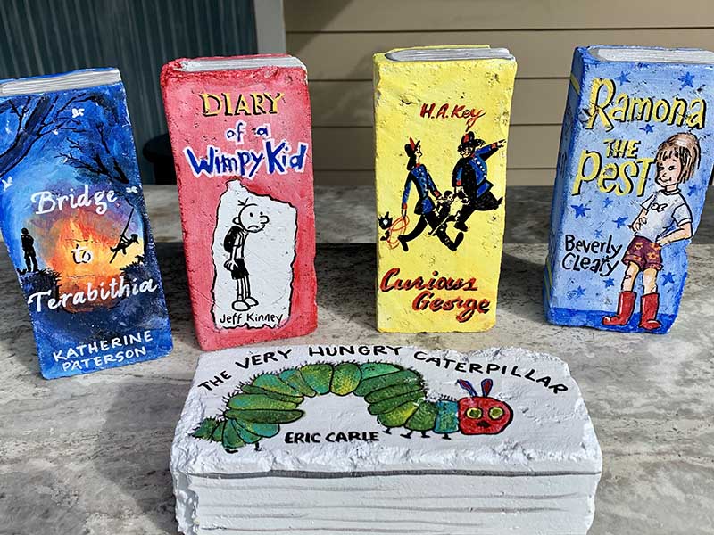 Bricks painted to look like children's books
