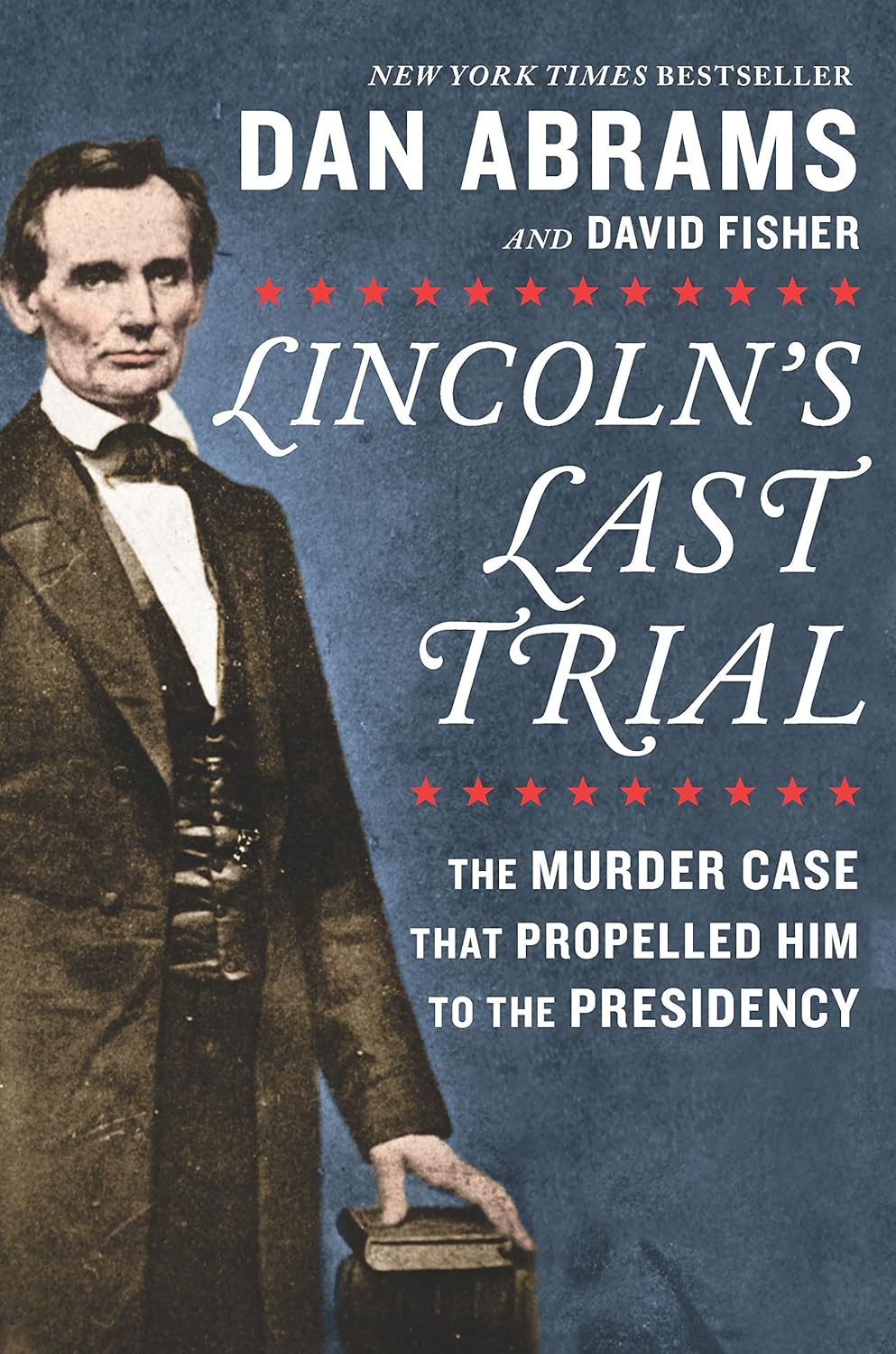 Dark grey book cover showing Abraham Lincoln with his hand resting on a closed book