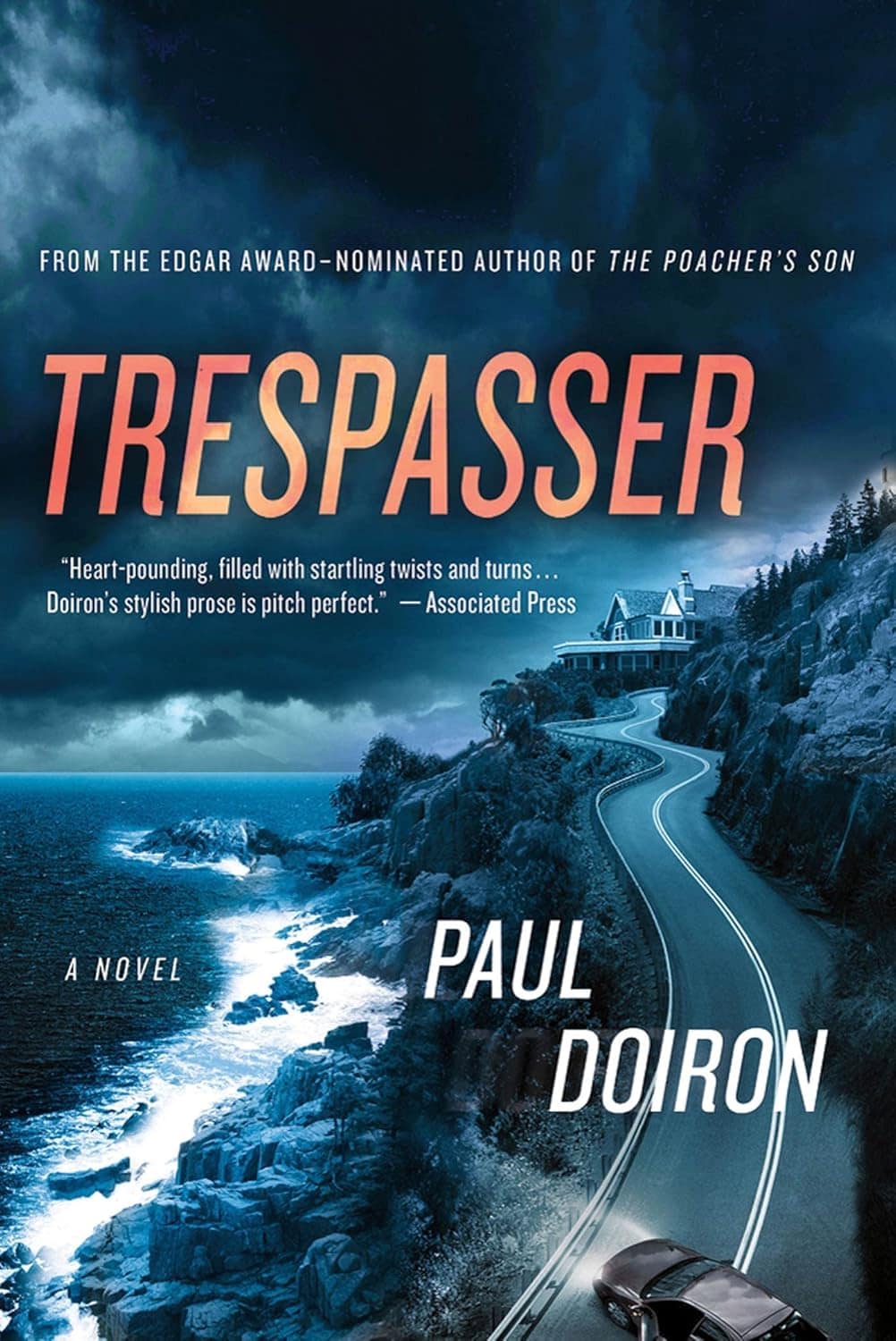 Blue-toned book cover showing an abandoned car on a winding coastal road and a distant house